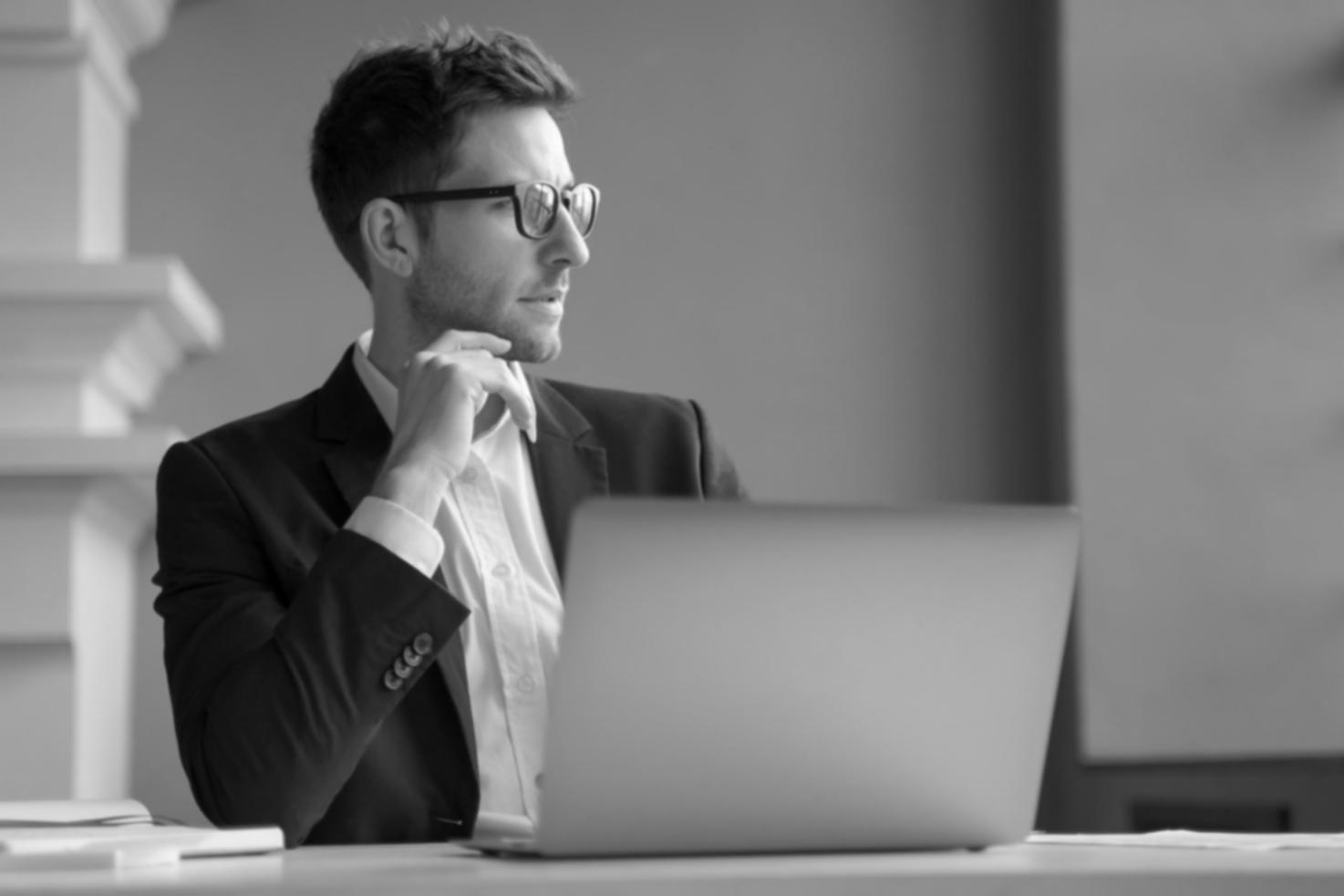 Business owners reviewing fraud prevention strategies